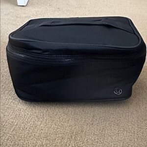 lululemon athletica Black Toiletry Kit with Dandelion-Patterned Lining